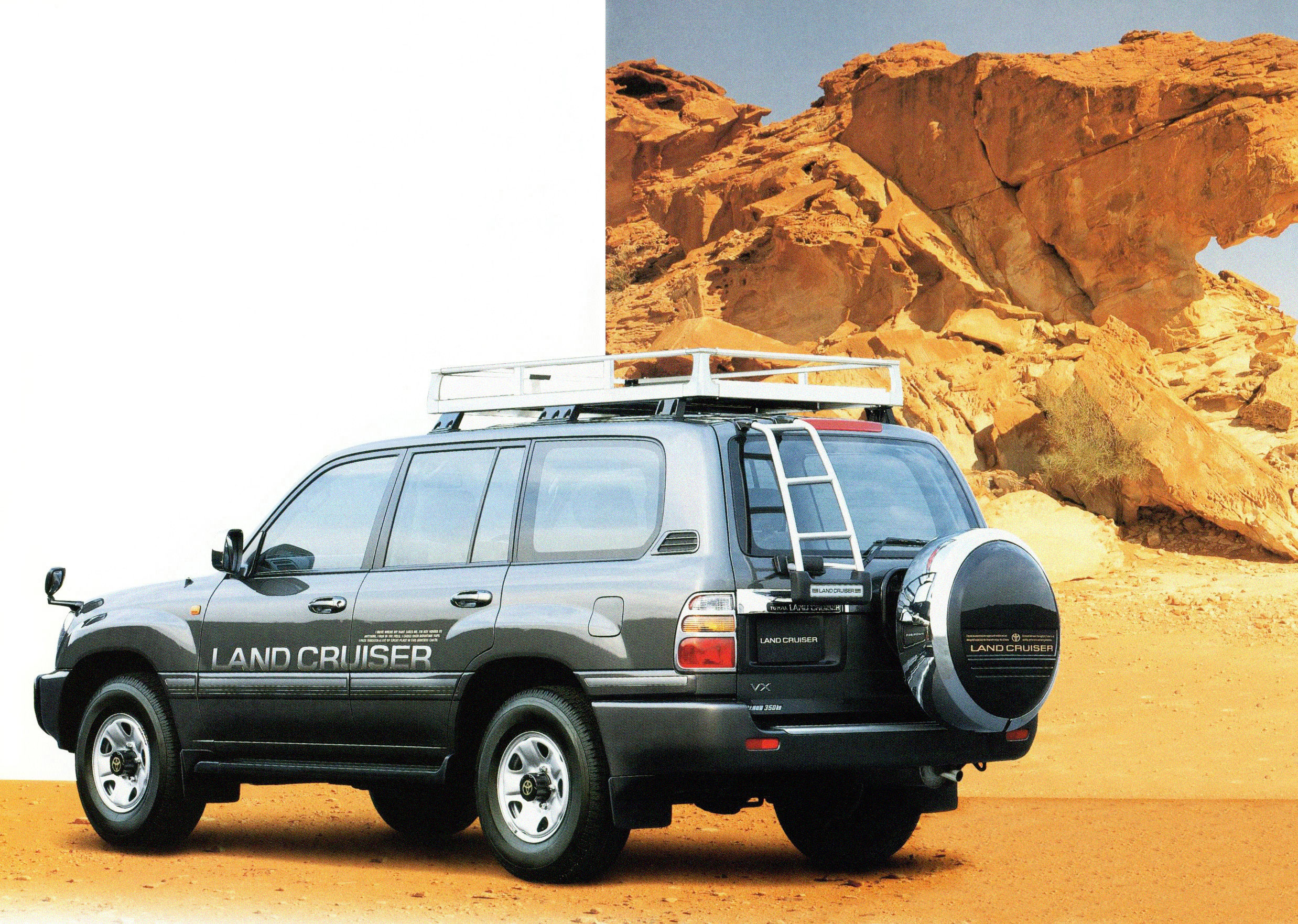 Ленд крузер двери. Тойота ленд Крузер 100 полицейский. Toyota Land Cruiser 100 Overland. Тойота ленд Крузер 100 с запаской на двери. Тойота ленд Крузер 1998 с запаской.